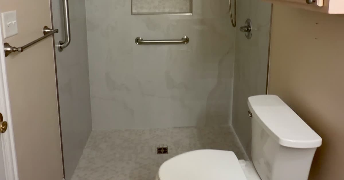 Completed curbless tub-to-shower conversion by Pioneer Construction in Gun Barrel City Texas