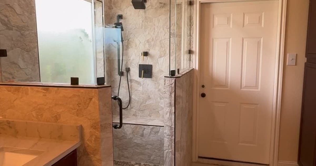 Bathroom layout remodel and LVP flooring project in Tyler TX by Pioneer Construction